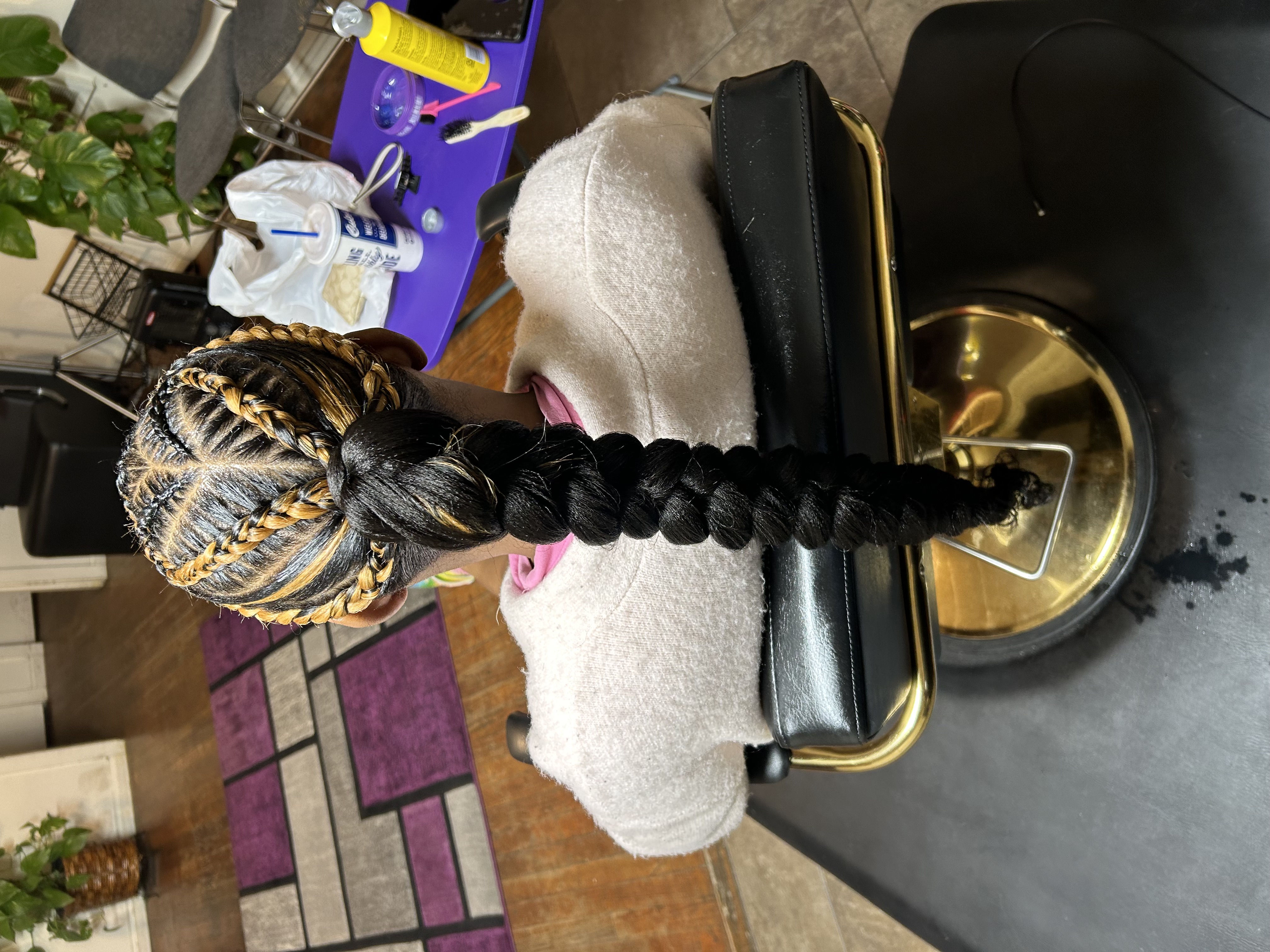 Intricate braided pattern with golden highlights