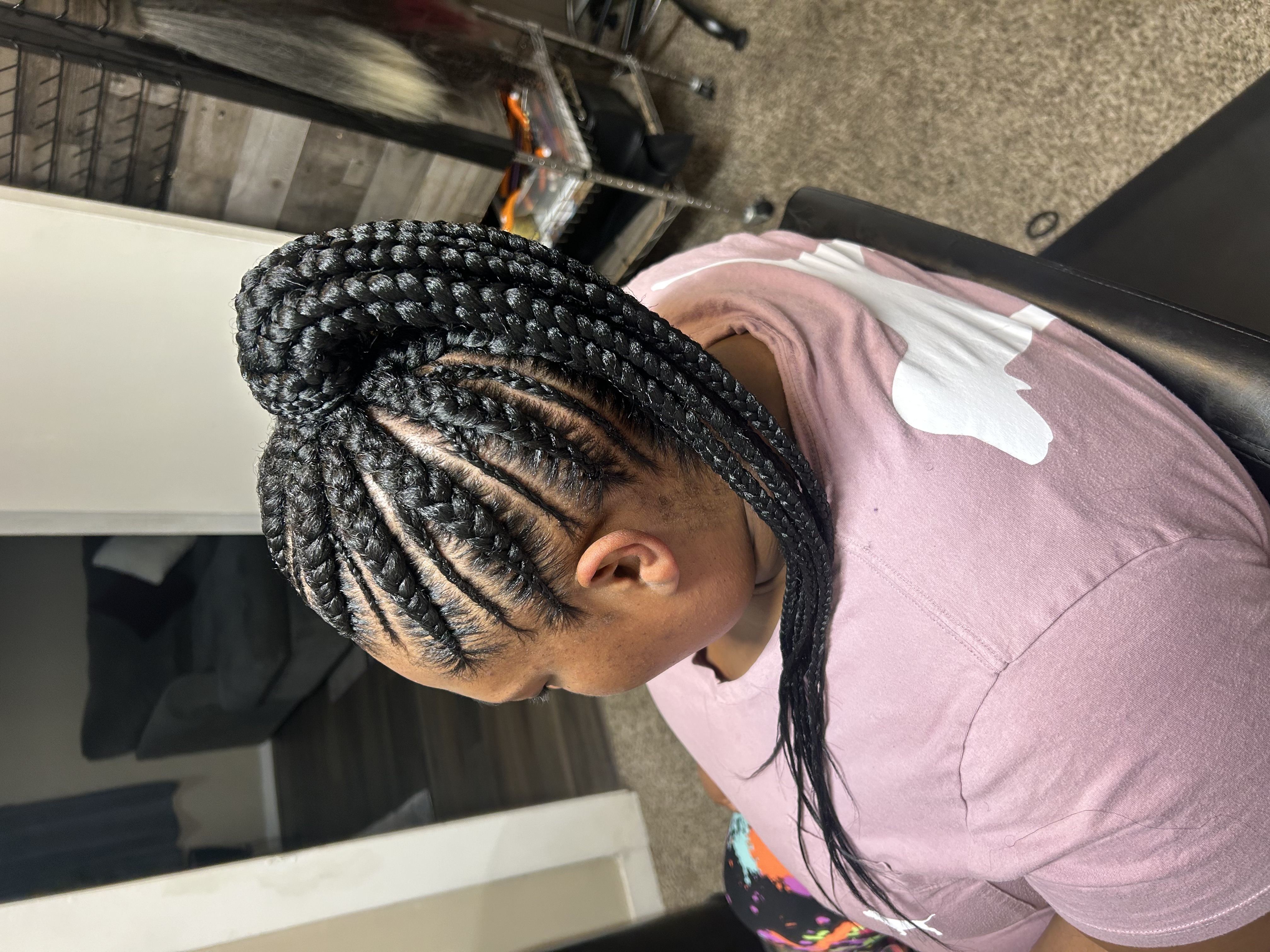 Cornrow braided updo style